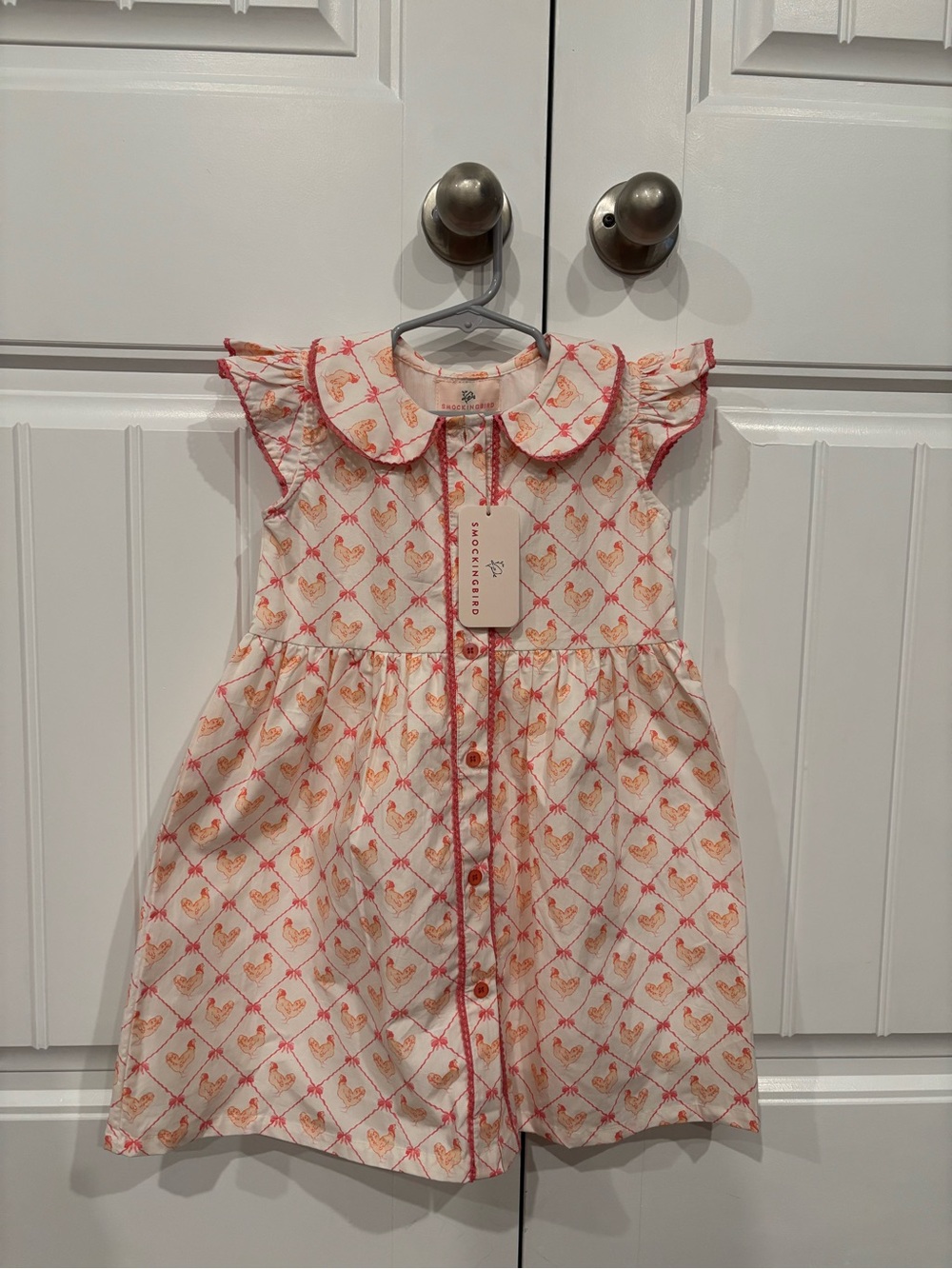 Smockingbird Button-Front Cotton Dress in Cream & Coral